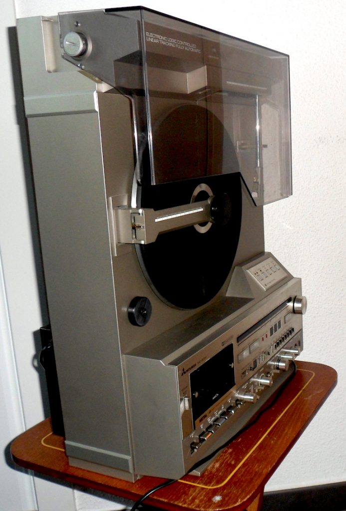 A rare vintage Mitsubishi X7 turntable in excellent condition. Playing a rare late Selena Quintanilla vinyl
